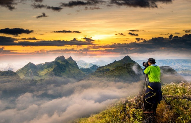 คนกำลังถ่ายรูปที่ดอยหลวงเชียงดาว