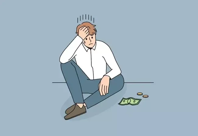 ผู้ชายนั่งมองเงิน ผู้ชายนั่งมองเงิน